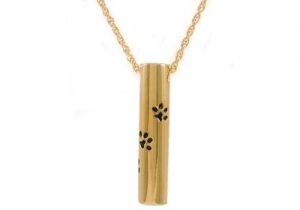 Gold Cylinder With Paws Pendant